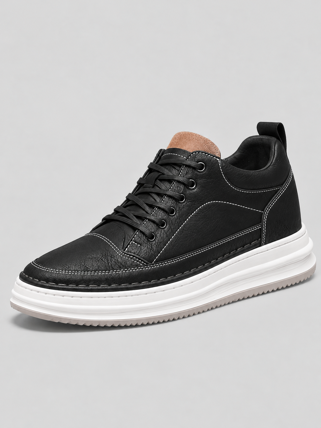 Men's black leather-look platform trainers with white sole, side view