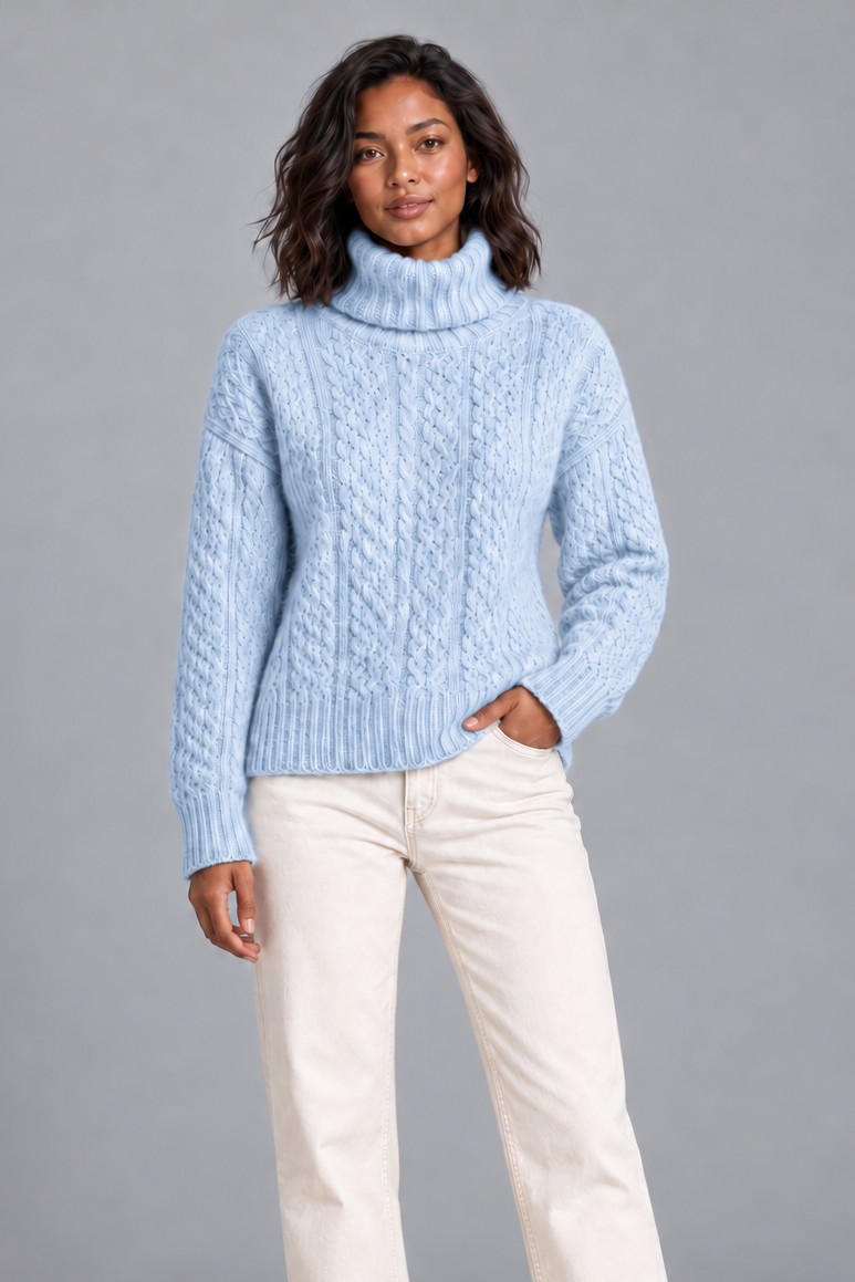 Women's light blue cable knit turtleneck sweater, front view