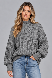 Women's grey chunky cable knit jumper, front view