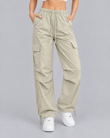 Women's khaki cotton parachute cargo trousers with drawstring waist, front view