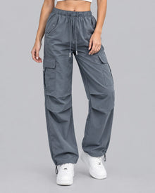 Women's grey cotton parachute cargo trousers with drawstring waist, front view
