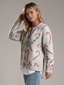 Women's candy cane buttoned cardigan – side walking view