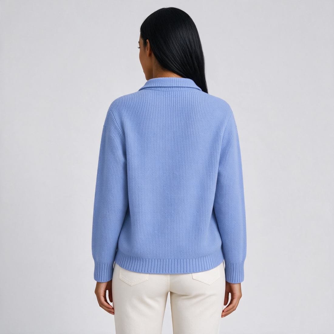 Women's cozy knit cardigan in blue, rear view