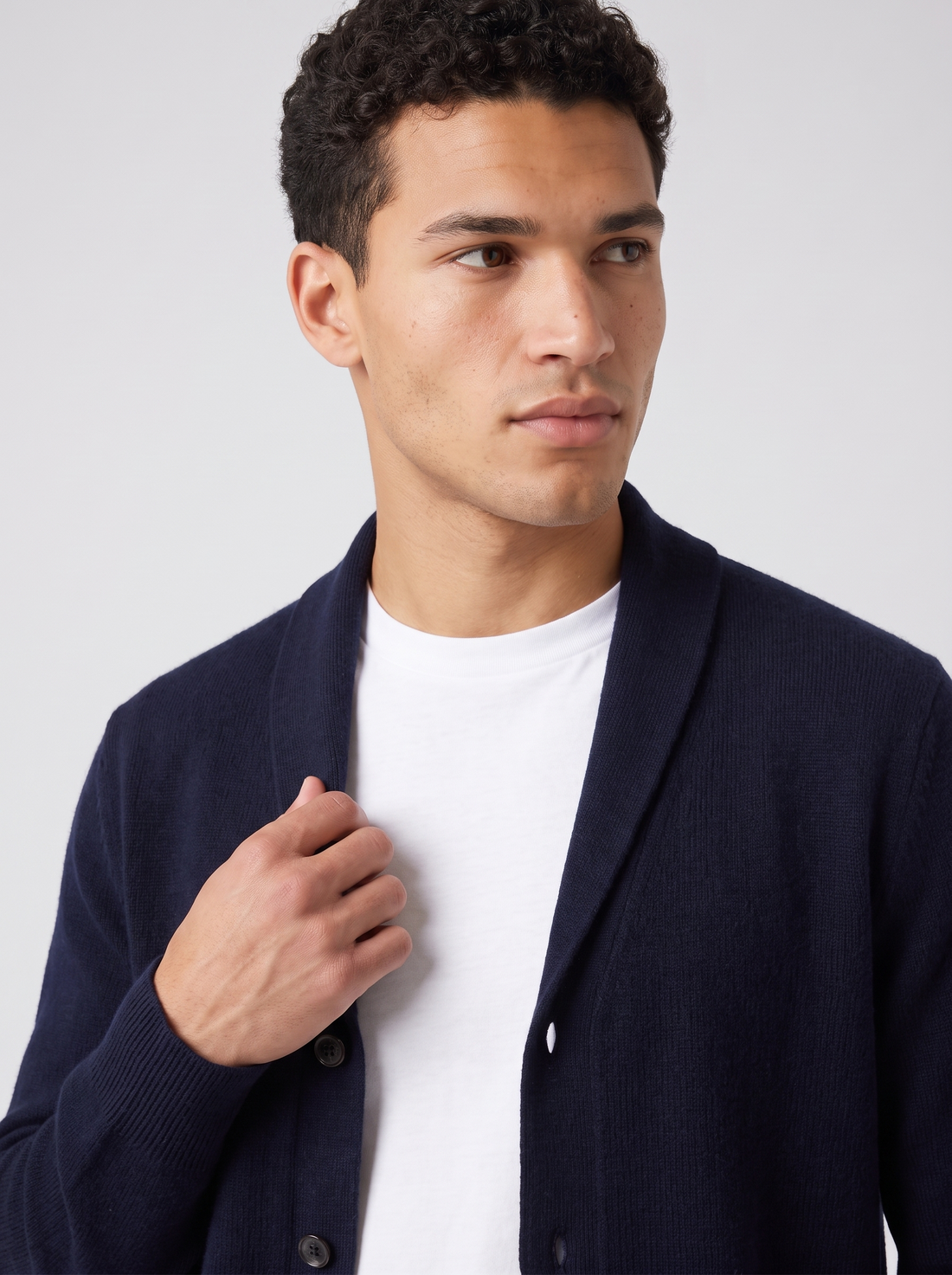 Men's Merino Wool Lapel Collar Cardigan in Navy – three-quarter view