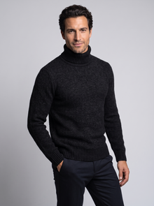 Men's Thick Knit Roll Neck Jumper in Black – three-quarter view