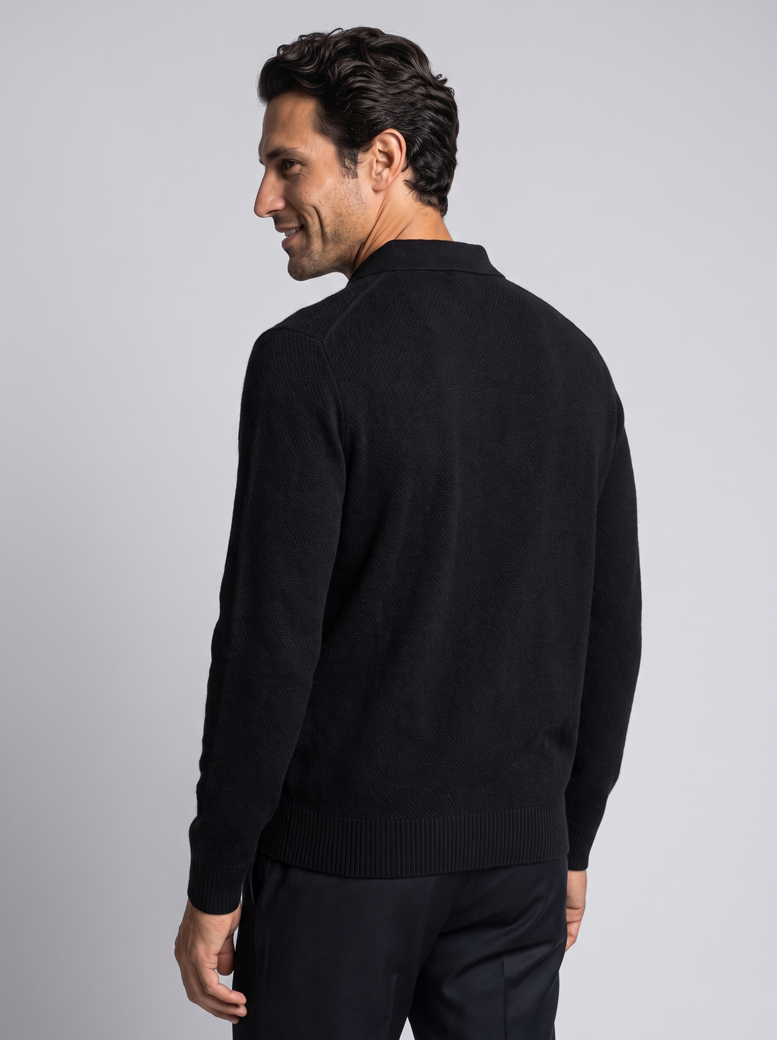 Men's Merino Wool Cashmere Knitted Polo in Black – three-quarter view