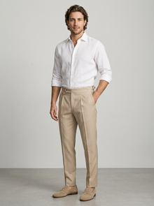Men's Tailored Pleated Smart Trousers in Beige – three-quarter view