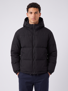 Unisex Oversized Hooded Puffer Jacket in Black – front view