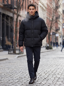 Unisex Oversized Hooded Puffer Jacket in Black – lifestyle shot