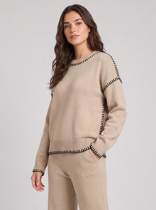 Beige knitted co-ord set, three-quarter view
