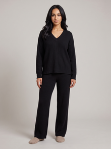 Women's ribbed knit lounge set in black, front view