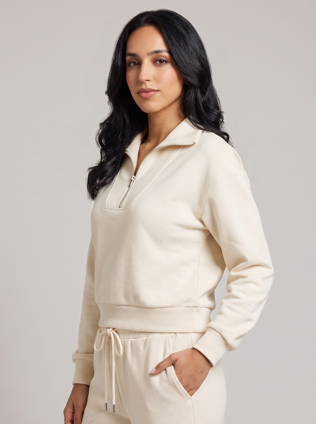 Women's half zip lounge set in cream, three-quarter view