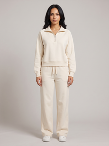 Women's half zip lounge set in cream, front view