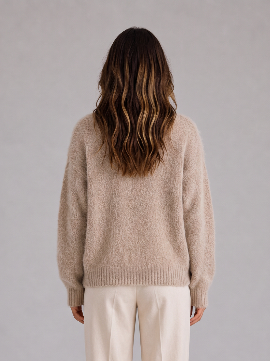 Model wearing khaki fluffy knit V-neck button cardigan, front view