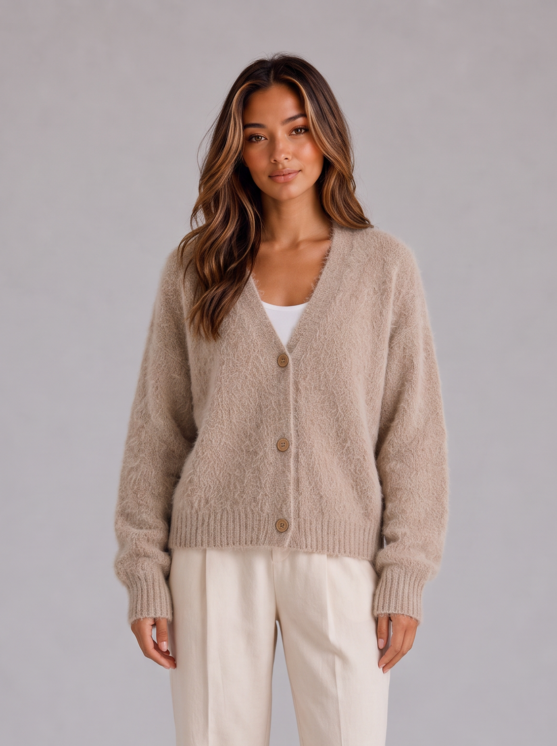 Model wearing khaki fluffy knit V-neck button cardigan, front view