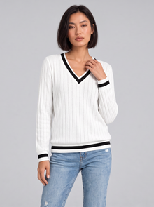Woman wearing ribbed V-neck contrast trim jumper in white