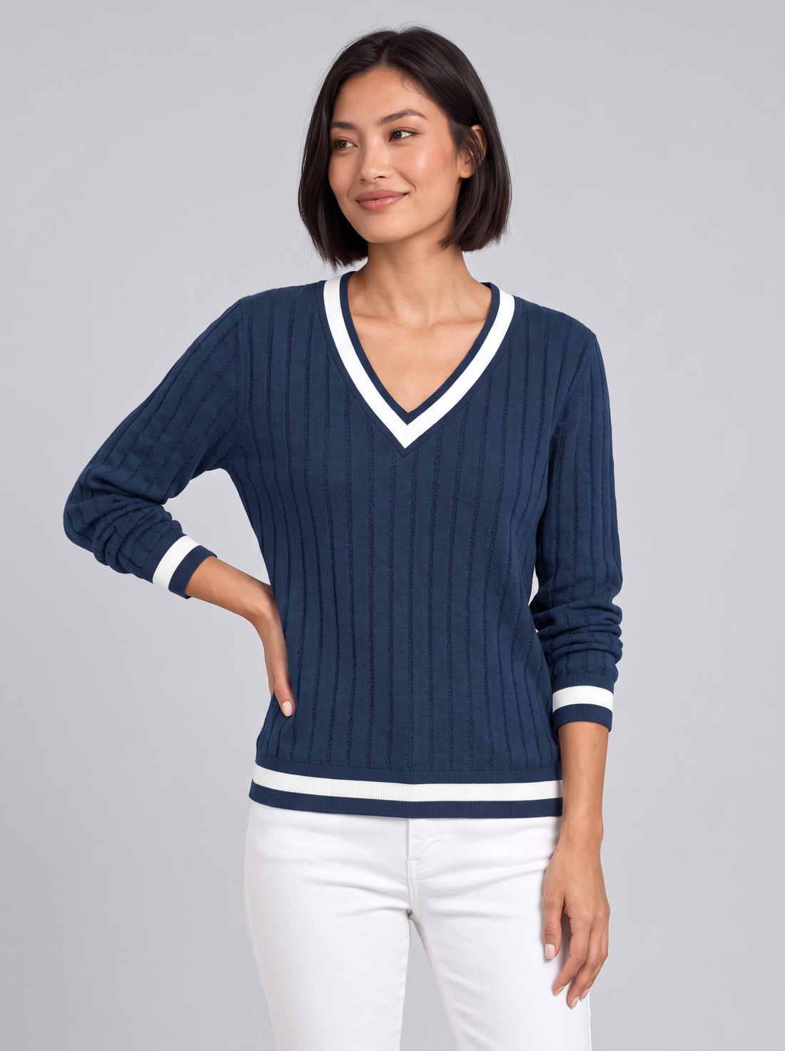 Woman wearing ribbed V-neck contrast trim jumper in blue