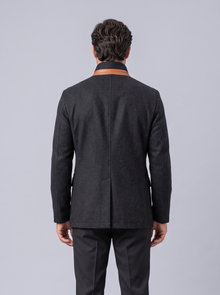 Back view of men's black vintage field jacket