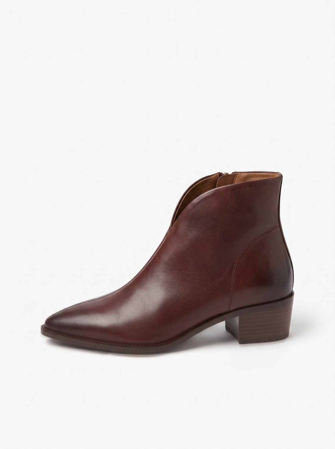 Side view of brown pointed toe ankle boot with V-cut collar