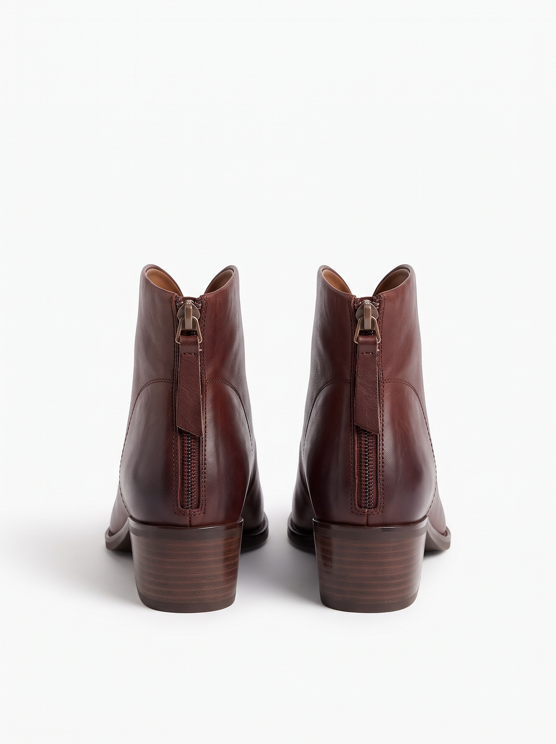 Back view of brown ankle boots with back zip and block heel