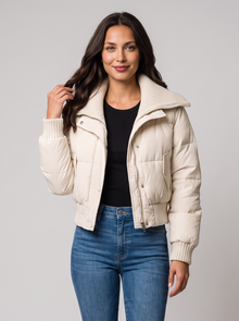 White cropped puffer jacket with ribbed knit collar on model