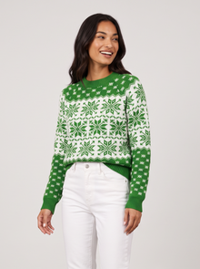 Women's green Fair Isle holiday sweater with snowflake pattern