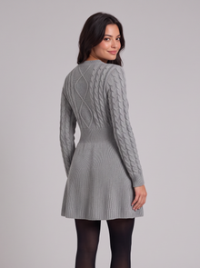Women's grey cable-knit sweater dress, back view