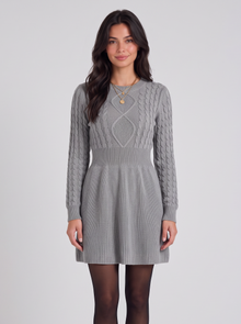 Women's grey cable-knit Christmas sweater dress, front view