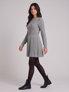Women's grey cable-knit sweater dress, side view
