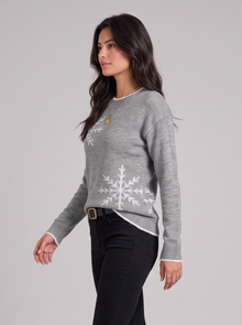 Women's grey snowflake knit sweater, side view
