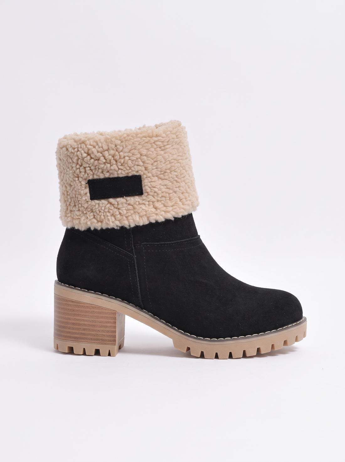 Women's black suede heat-lined ankle boots with sherpa cuff, three-quarter view
