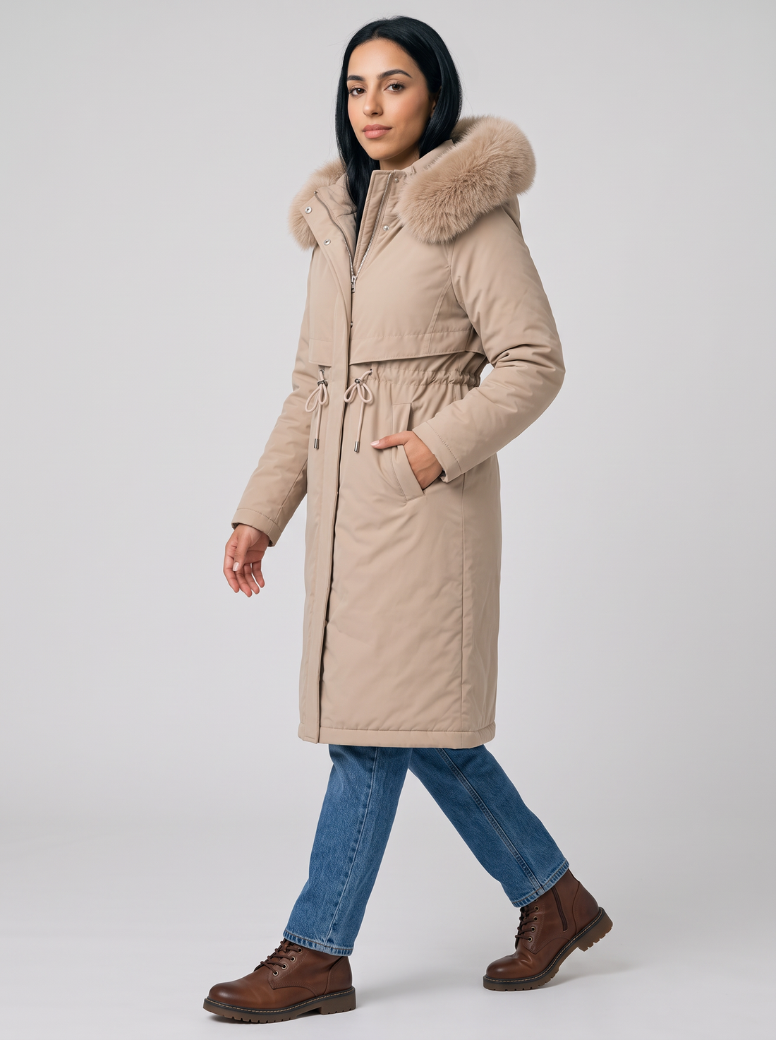 Women's beige long hooded winter coat, side view walking