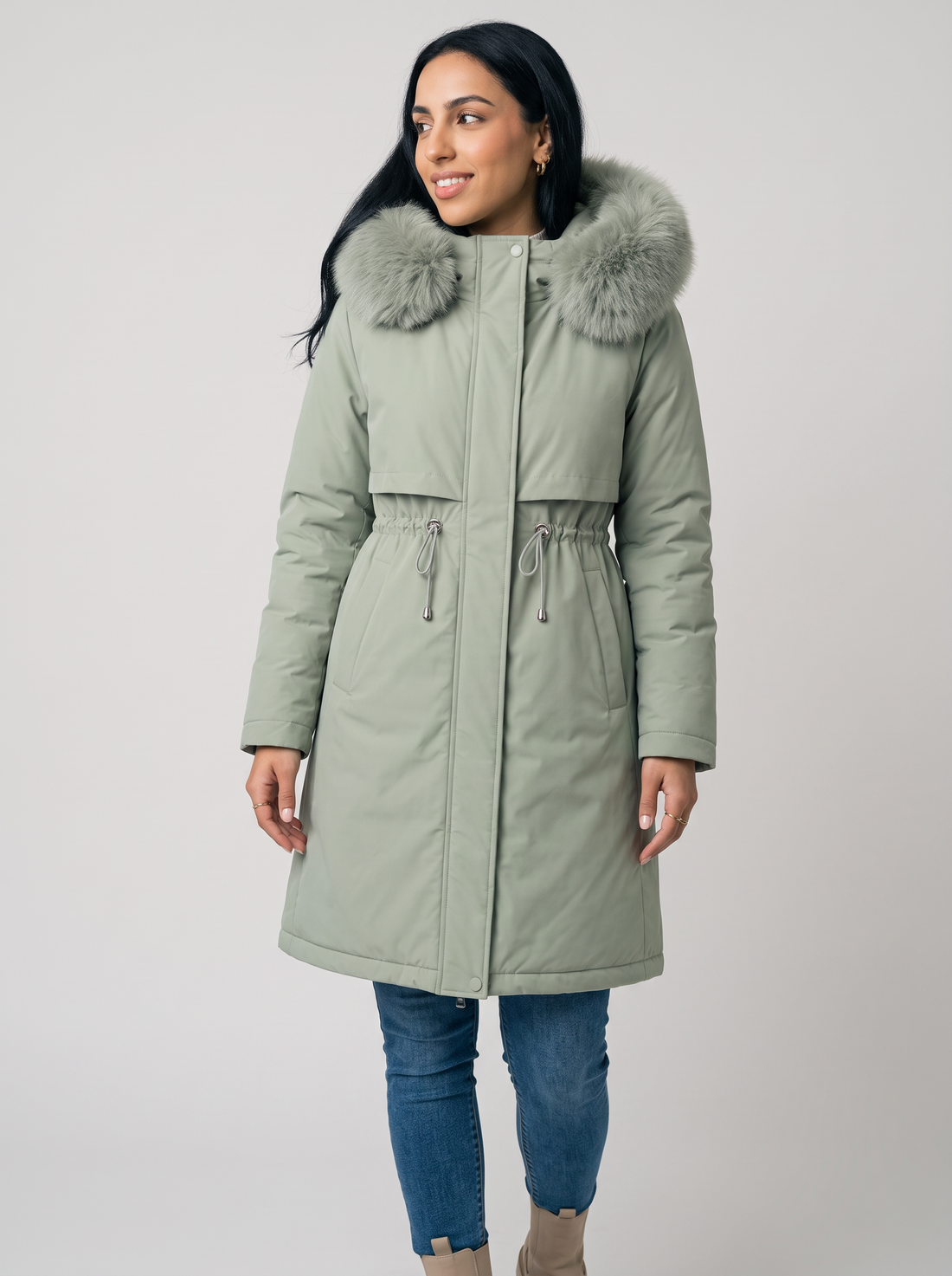 Women's green long hooded winter coat with faux fur trim