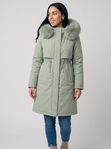 Women's green long hooded winter coat with faux fur trim