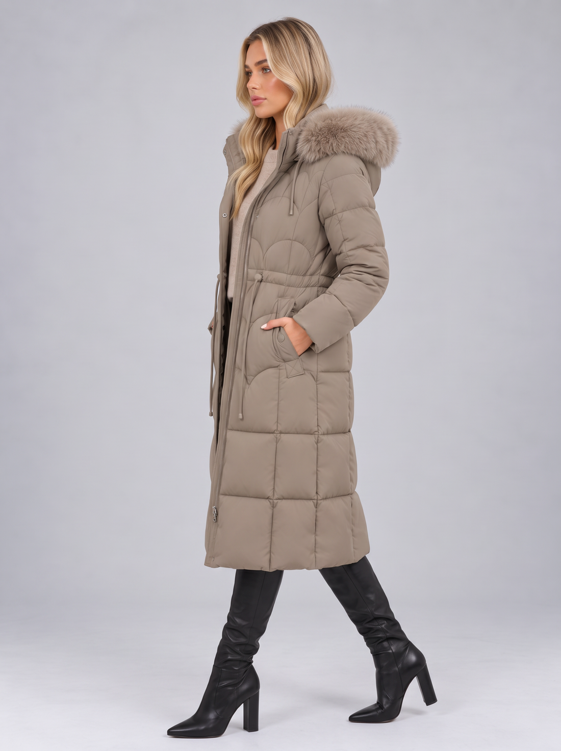 Women's khaki longline quilted puffer coat, side view walking