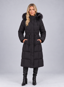 Women's black longline quilted puffer coat with faux fur hood