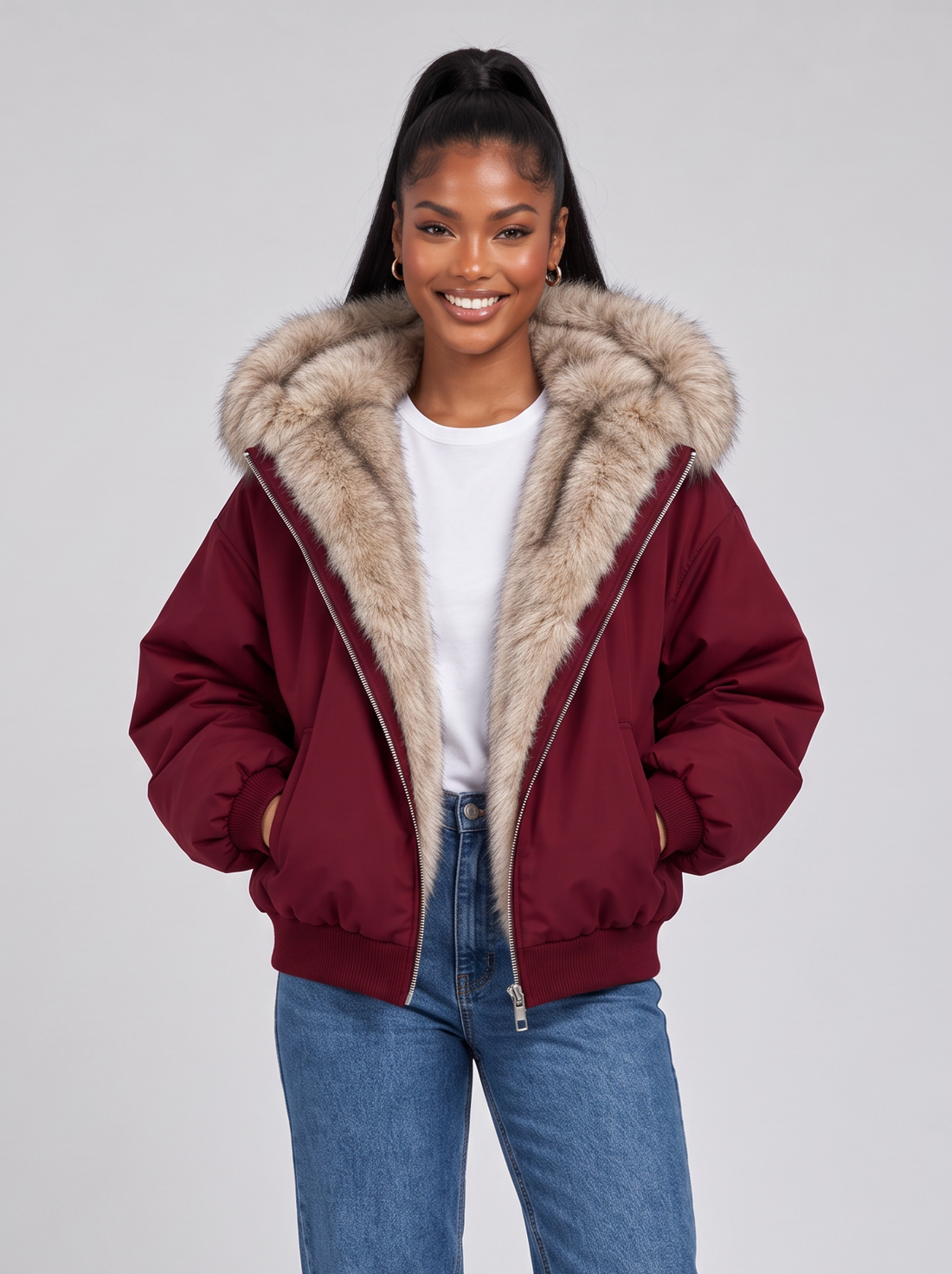 Women's dark red puffer jacket with faux fur hood