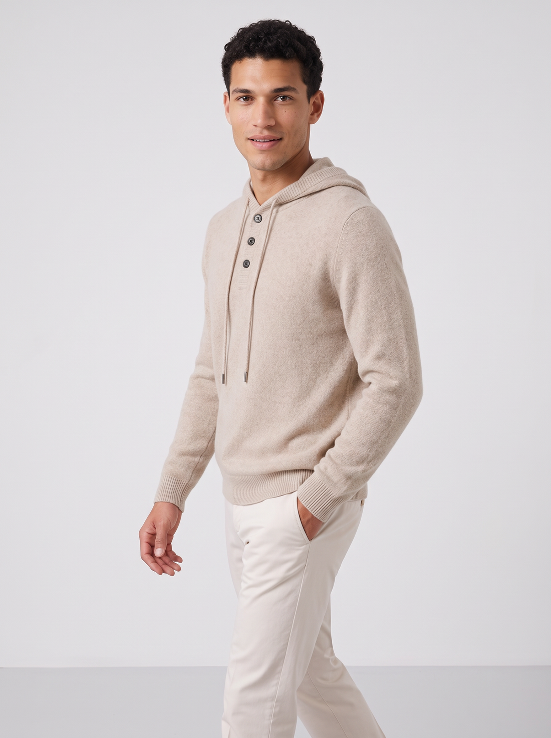 Men's sand beige cashmere hoodie, side view walking