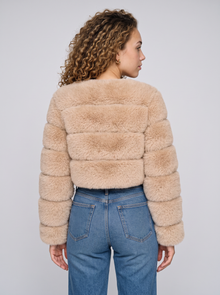 Women's short beige faux fur jacket, back view