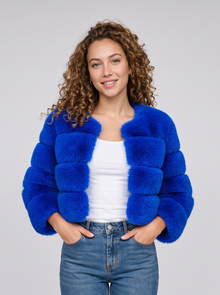 Women's short blue faux fur jacket with fluffy panels