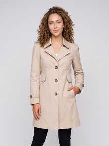Women's fitted beige single-breasted trench coat, front view