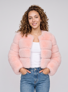 Women's short light pink faux fur jacket with fluffy panels