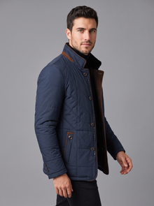 Side view of men's navy quilted stand-collar jacket