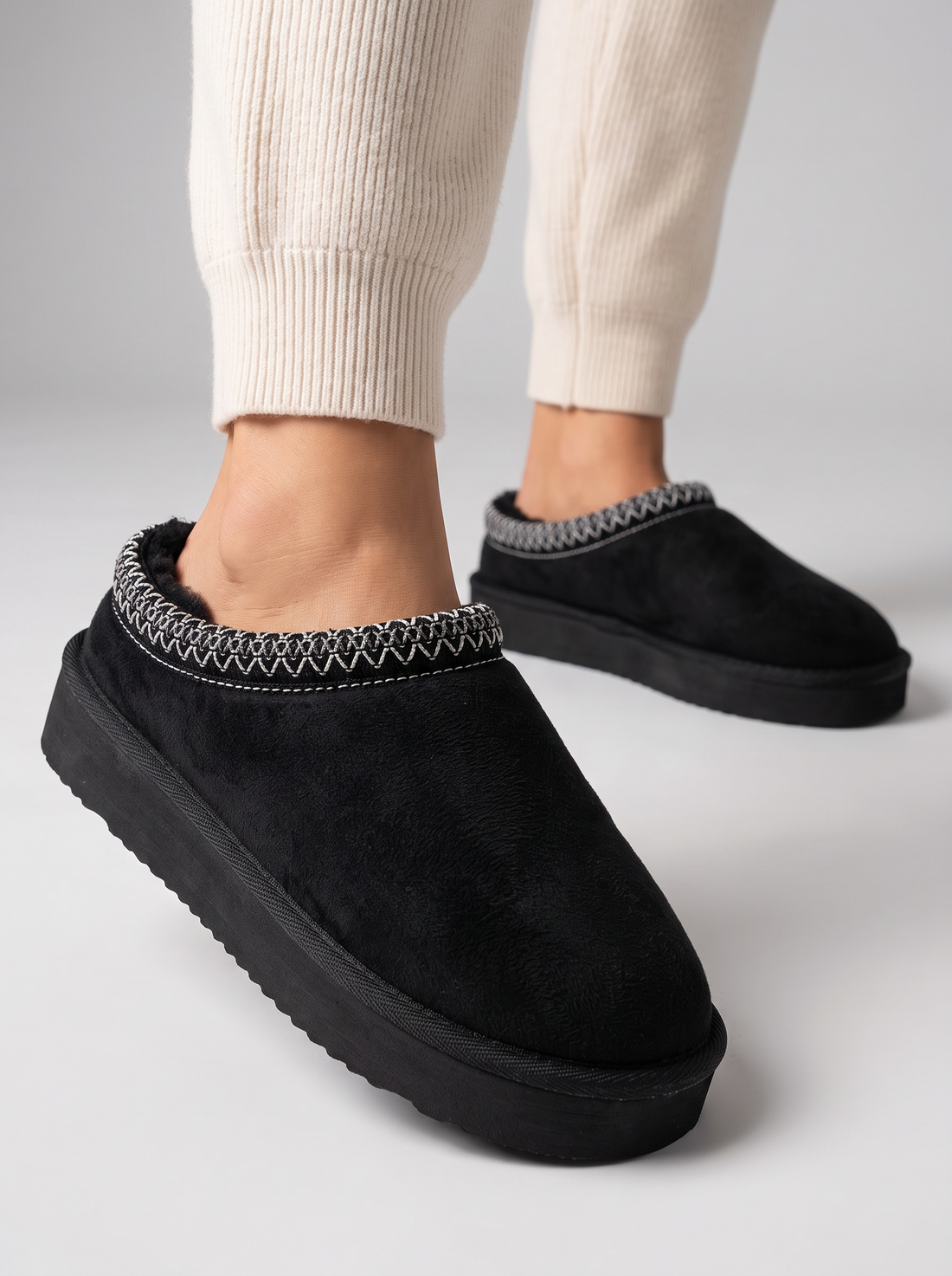 Women's Plush Slippers in Black – close-up of plush texture and closed toe