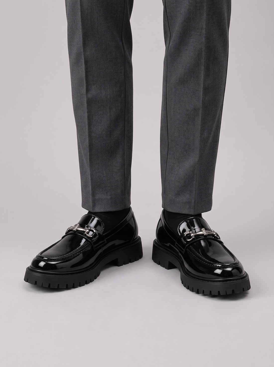 Men's Chunky Loafers in Bright Black – close-up of metal detail and platform sole