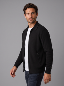 Side view of men's black zip-up textured jacket