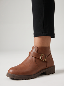 Women's Heeled Boots in Brown – close-up of texture and low heel