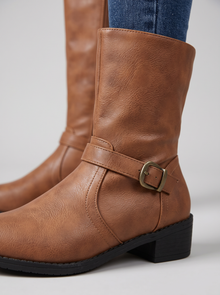 Women's Knee High Boots in Light Brown – close-up of buckle strap and block heel