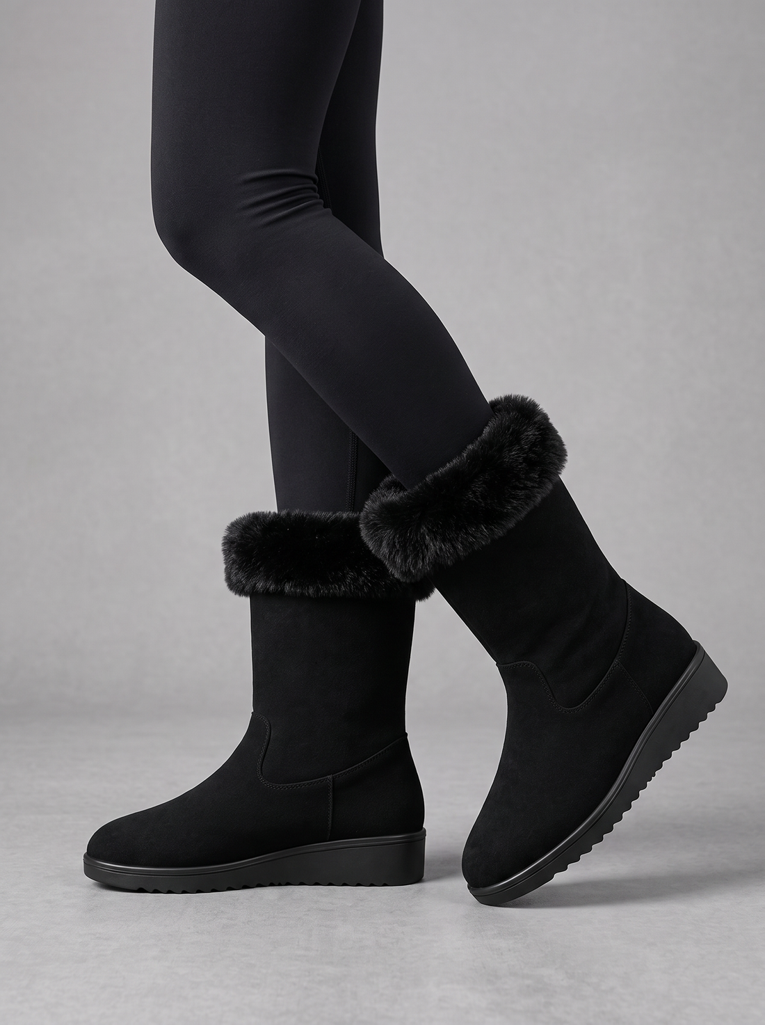 Black suede faux fur cuff wedge boots, front view