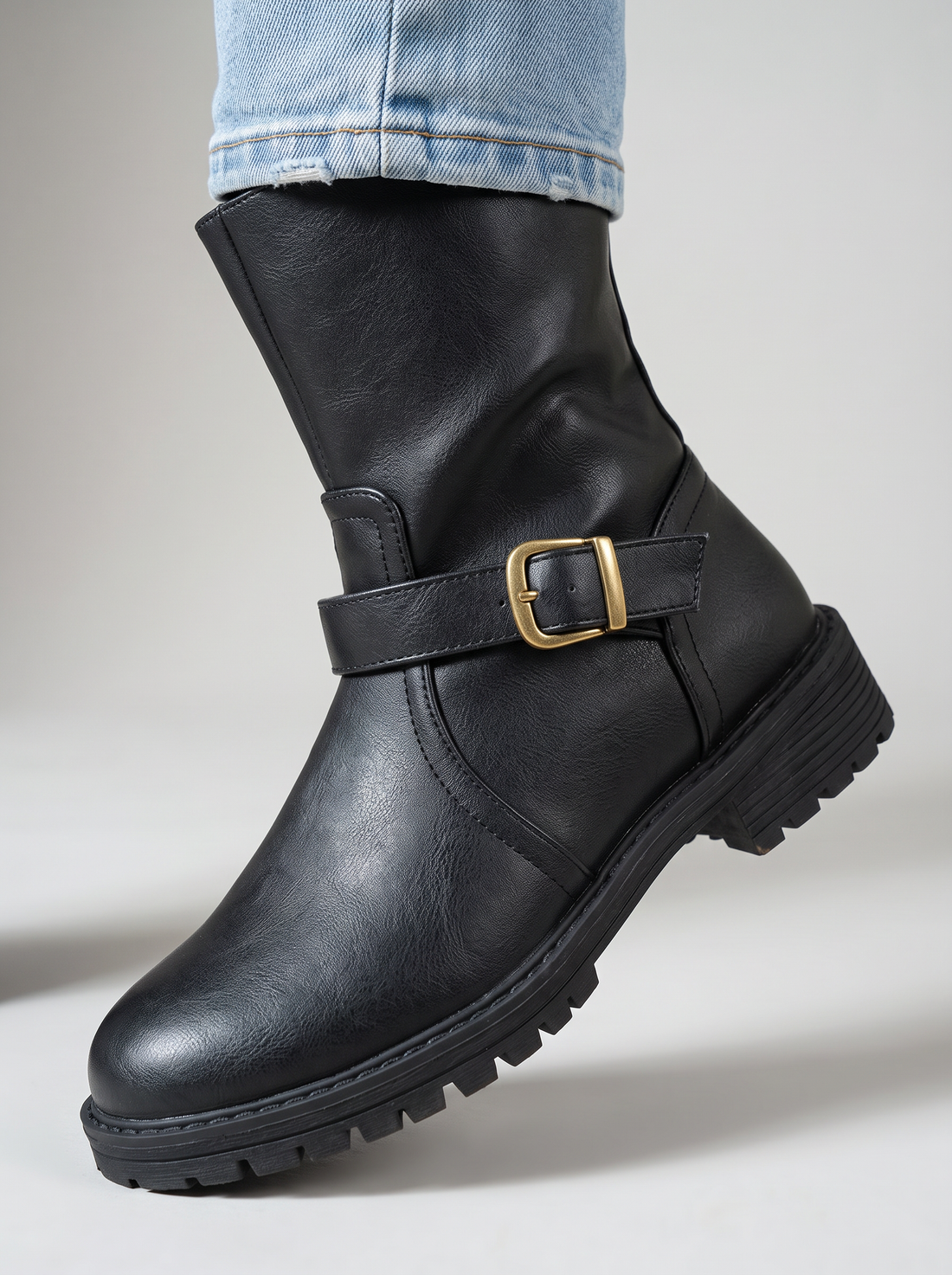 Women's Buckle Boots in Black – close-up of buckle detail